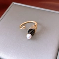 Detailed macro view of the vintage gold butterfly ring with black leaves and pearls - Gold Black Leaf Pearl Style (13#)