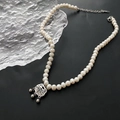 Baroque pearl necklace with silver Fu character pendant and small bells detail - 01-E16 Titanium Steel Peace Lock Natural Pearl Necklace Fu