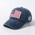Washed navy blue cotton baseball cap featuring USA flag and side embroidery detail - Adjustable / Navy Blue