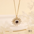 Macro shot of evil eye pendant with brown iris and zircons on gold chain necklace - Brown Flower-E1