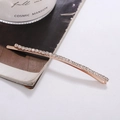 Fermaglio per capelli oro rosa con strass scintillanti su sfondo bianco sobrio - Base Oro Rosa Bianco Zircone