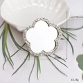 Close-up of 50mm silver flower vanity mirror charm with crystal rhinestones detail - Flower / Silver