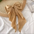 Champagne satin bow hair clip with elegant long ribbons on a woven tray - Khaki Solid Long Streamer
