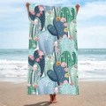 Double-sided microfiber beach towel with cactus and floral print held by a model - B28-Full Print Cactus Floral Illustration