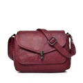 Bolso bandolera vintage rojo vino en cuero aceitado con cierre giratorio de metal - Burdeos