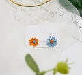 Asymmetric daisy stud earrings in matte orange and blue with 925 silver needles - Orange and Blue
