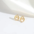 Elegant gold hollow bee stud earrings with micro-inlaid zircons on white silk background - Hollow Bee
