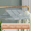 Set of 10 non-slip grey clothes hangers with heavy-duty metal hooks and trace-free design - Grey (Standard 40g)