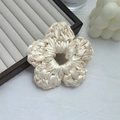 Off-white floral woven satin scrunchie with a lustrous silk finish and elegant texture - Flower / White