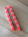 24 links wacky tracks fidget toy in orange and white colors on wooden surface - White-Orange