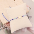 Close-up of bohemian beaded bracelet with cream starfish pendant and blue woven cord - White Pentagram Blue Woven Style (6#)