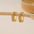 Close-up of gold V-shaped zircon earrings hanging on a natural branch with bokeh effect - EH410030-Gold Triangle Hollow
