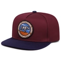 Detail of embroidered mountain goat patch on burgundy and navy hip hop snapback hat - Wine Red Crown Dark Blue Flat Brim / Red