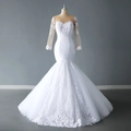 Elegant white mermaid wedding dress with illusion sleeves and intricate lace appliques - US 2 / White