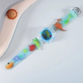 Light blue translucent silicone kids watch featuring 3D colorful dinosaur patterns - Dinosaur Light Blue