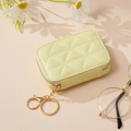 Quilted pale yellow portable makeup pouch with gold zipper and keychain clip - Light Yellow