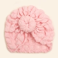 Detailed view of pink baby donut turban hat with soft pleated texture and floral knot - Pink