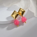 Detailed close-up of 14K gold-plated rhombus beads and pink faceted charm earrings - Rose Red