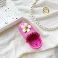 Detail of pink clog phone stand with sunflower charm on a stylish textured background - Transparent Bracket-Flower Clog Shoe / Rose Red