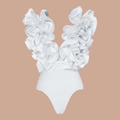 Detail of white swimsuit featuring elegant multi-layered ruffled V-neck and mesh textures - White Swimsuit