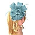 Elegant teal fascinator hat with linen bow and feather accents for party wear - Sky Blue