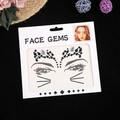 Self-adhesive face gems with black and clear rhinestones in fox eye style layout - Classic Black & White