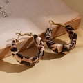 Detail shot of leopard print fabric wrapped hoop earrings with gold metal accents - Hoop Earrings - Coffee Brown - Round (3cm)