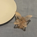 Elegant peach translucent butterfly hair claw clip with golden metal spring on blue cloth - Gradient Orange