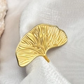 Ginkgo leaf brooch with golden finish and detailed vein texture on silk background - Ginkgo