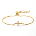 Detailed close-up of a golden cross bracelet with cubic zirconia and adjustable chain - Style 12