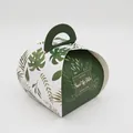 Detailed view of 50 tropical leaf candy boxes with handles in clear OPP bag packaging - Green Leaf Pattern Box Without Ribbon