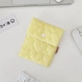 Pale yellow quilted sanitary bag with heart pattern and white button closure - Yellow Heart