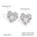 Detail of silver heart earrings with pearl inlay and textured stainless steel edges - Silver Heart Style (YYE025138-P)
