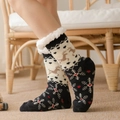 Thick black sherpa floor socks featuring reindeer and snowflake knit patterns - Navy Reindeer