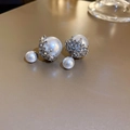 Close-up of pearl stud earrings with silver crown setting and sparkling zircon stones - Silver Pearl Studs (16#)