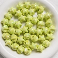 Macro view of light green iridescent star beads on a white plate for DIY jewelry making - 16mm (Hole approx 2.5mm) / Green