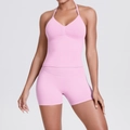 Detail of ribbed waist support and seamless knit texture on light pink yoga set - XS / Barbie Pink