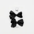 Set of two black ribbed ribbon bow hair clips for girls on a fashion display card - Black