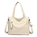 Detail of beige PU leather shoulder bag with tassel zipper and embossed text logo - Off White