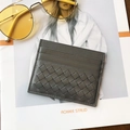 Gray woven sheepskin leather card holder with multiple slots on a stylish magazine - Gray