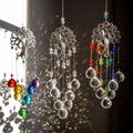Three Tree of Life suncatchers with crystal balls creating rainbow light reflections - 3-Piece Tree of Life Set