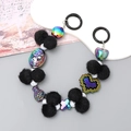 Chic black plush ball and beaded phone wrist strap with retro portrait charms - Black Cameo Style (K2767)