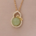 Golden gourd necklace with green gemstone and bow pendant on a delicate chain - 95#XL2161-14