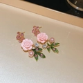 Detail of rose stud earrings with pink camellia petals, green leaves and hanging pearls - Stud Earrings (925 Silver Pin) / Pink Flower Leaf Stud Earrings