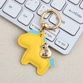 Yellow leather horse keychain with a gold money bag charm and blue accents - Mini / Yellow