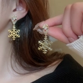 Close-up of reindeer stud and snowflake charm earrings with rhinestones on model - Reindeer Snowflake Shape Style (7#)