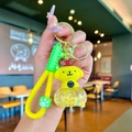 Cartoon dog acrylic liquid sand keychain with golden stars and green wrist strap - Yellow Luminous Pompompurin Car Style