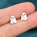 Cute Halloween ghost stud earrings in silver metal held by fingers to show size - White Gold
