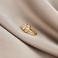 Macro view of gold puzzle-shaped non-piercing clip with micro-set cubic zirconia - Puzzle (E5689-16)