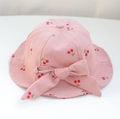 Pink cotton baby bucket hat with cherry print and large bow decoration - 48cm (Recommended for 6-18 Months) / Pink